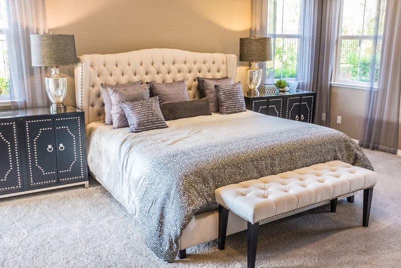 An elegant, calm living room with neutral tones, layered textures, and a few well-chosen pieces.