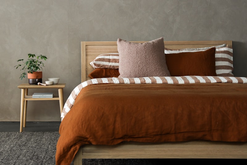 A harmonious open living and dining space with a shared palette, repeated wood tones, and consistent styling
