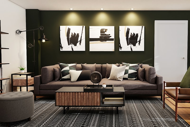 An eclectic living room mixing a modern sofa, an antique chair, layered art, and varied textures in a warm palette